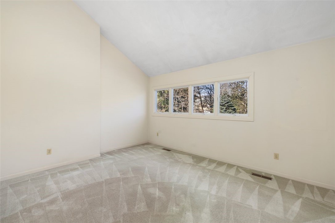 4496 Post Road, Unit 3 Warwick, RI 02818 - Photo 22 of 44 Second bedroom with vaulted ceiling