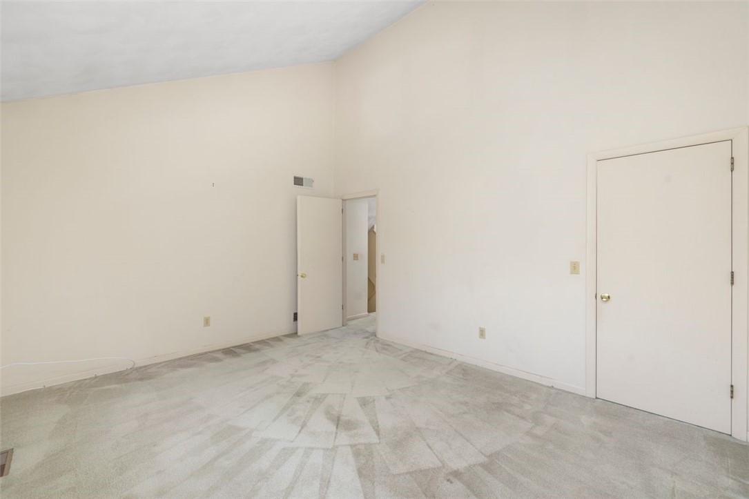 4496 Post Road, Unit 3 Warwick, RI 02818 - Photo 23 of 44 Second bedroom with vaulted ceiling