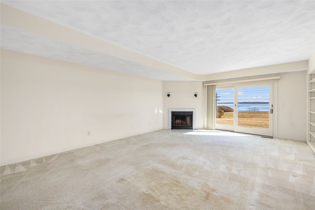 4496 Post Road, Unit 3 Warwick, RI 02818 - Photo 6 of 44 Living room with water view.