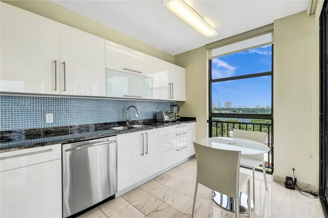 a view of a living room with furniture