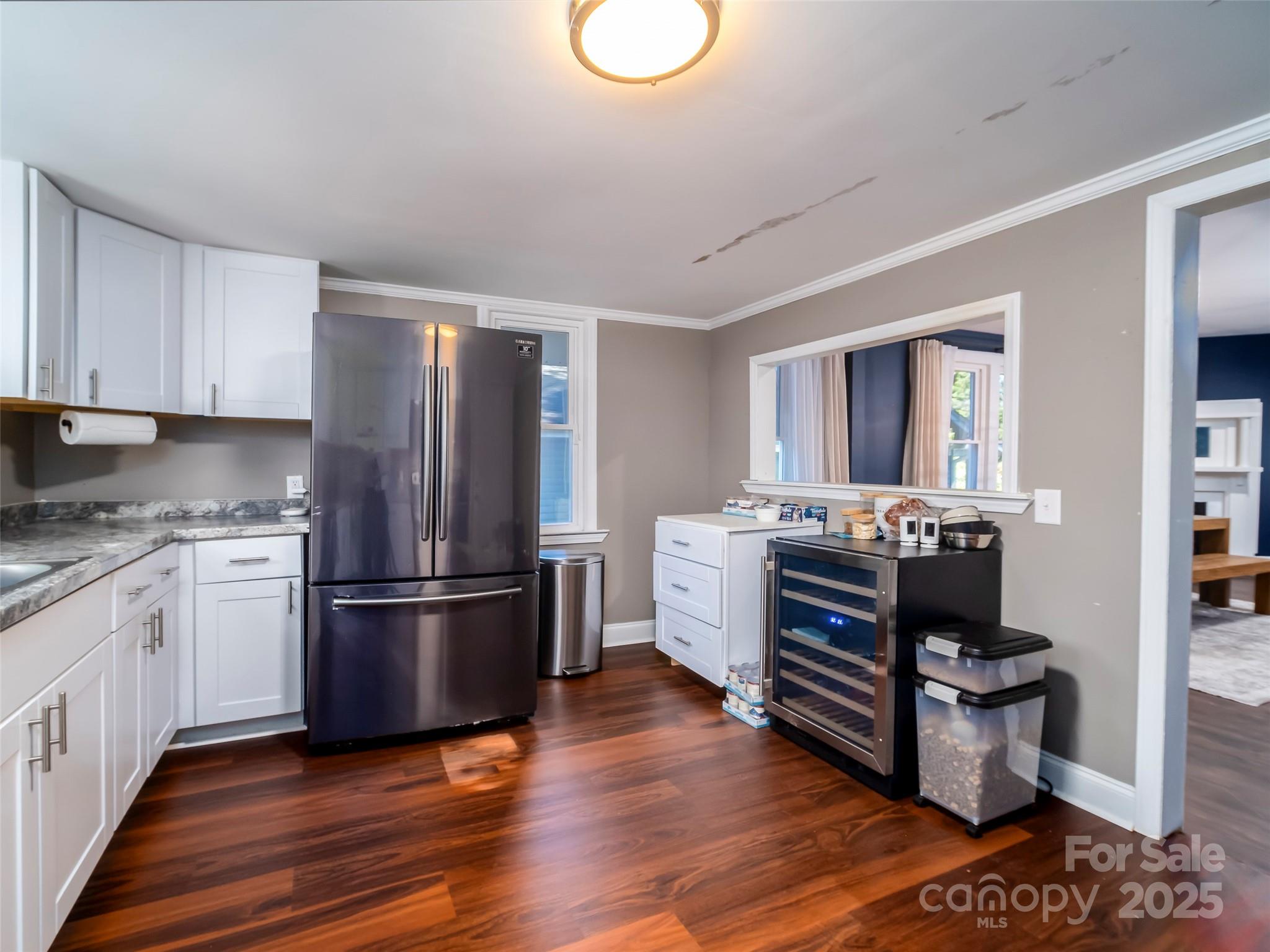 525 West 2nd Avenue Gastonia, NC 28052 - Photo 15 of 39 a kitchen with stainless steel appliances a stove and a refrigerator