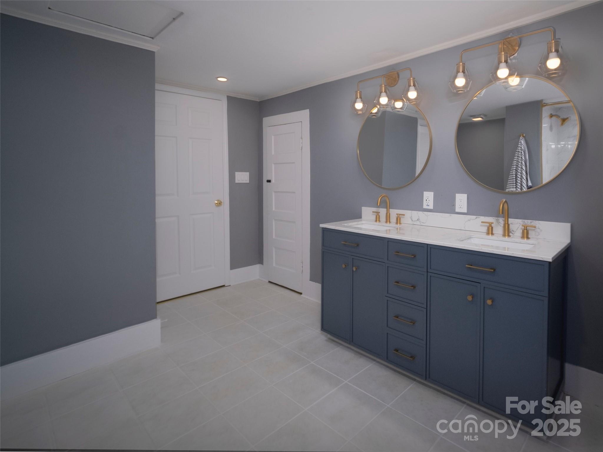 525 West 2nd Avenue Gastonia, NC 28052 - Photo 22 of 39 a spacious bathroom with a double vanity sink mirror and double