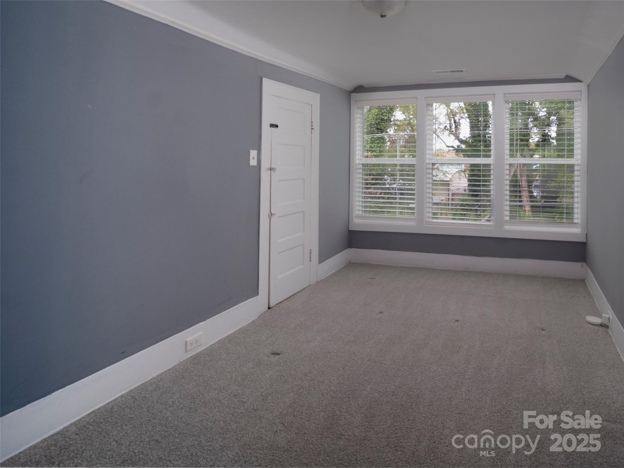 525 West 2nd Avenue Gastonia, NC 28052 - Photo 25 of 39 a view of a room that has a window in it