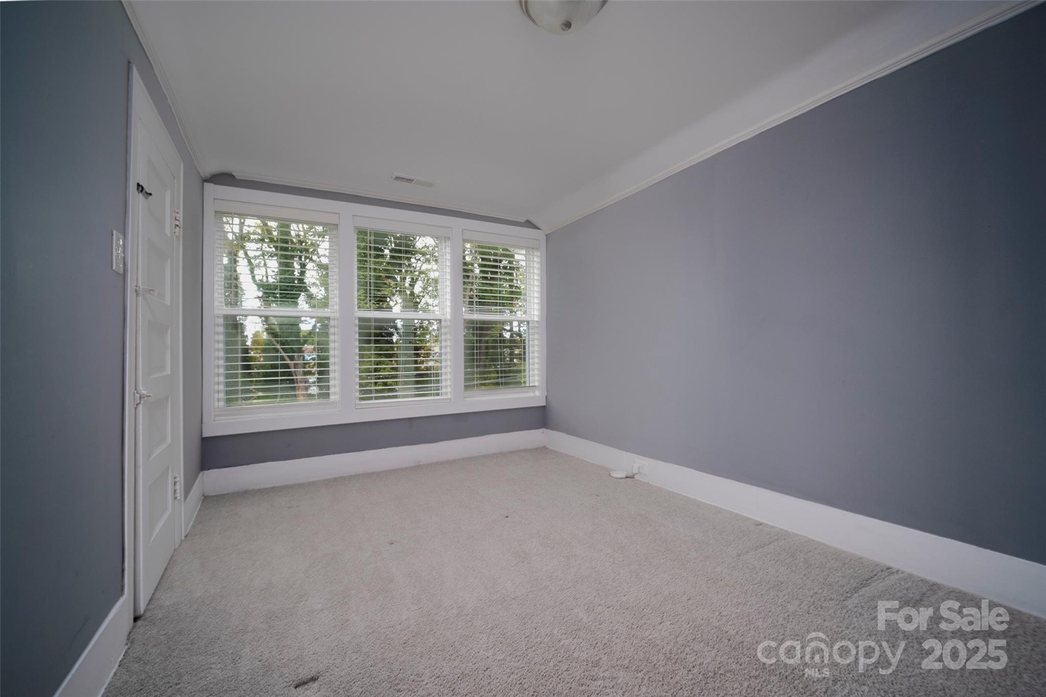 525 West 2nd Avenue Gastonia, NC 28052 - Photo 27 of 39 a view of an empty room with a window