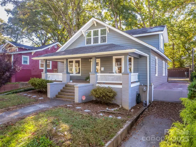 front view of a house with a small yard