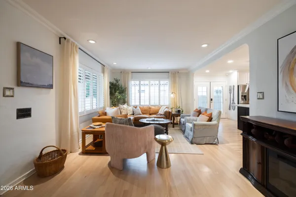 a kitchen with stainless steel appliances a refrigerator and cabinets
