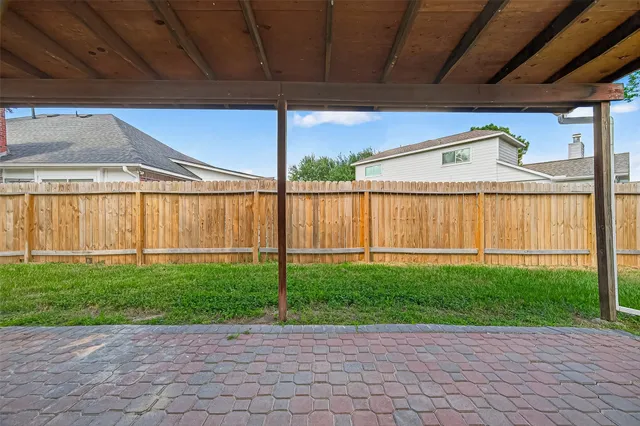 a view of porch with a backyard
