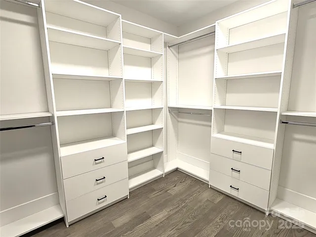 a view of an empty walk in closet