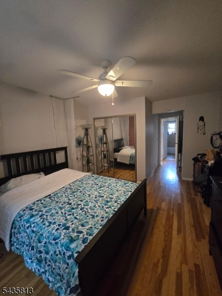 37 Espy Road, Unit 6B Caldwell, NJ 07006 - Photo 3 of 5 a bedroom with a bed and wooden floor