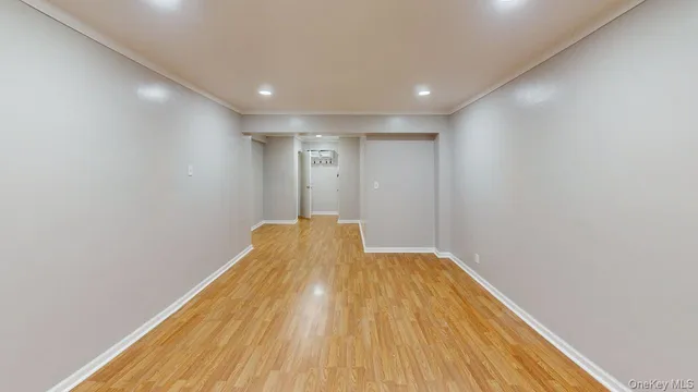 a view of a big room with wooden floor