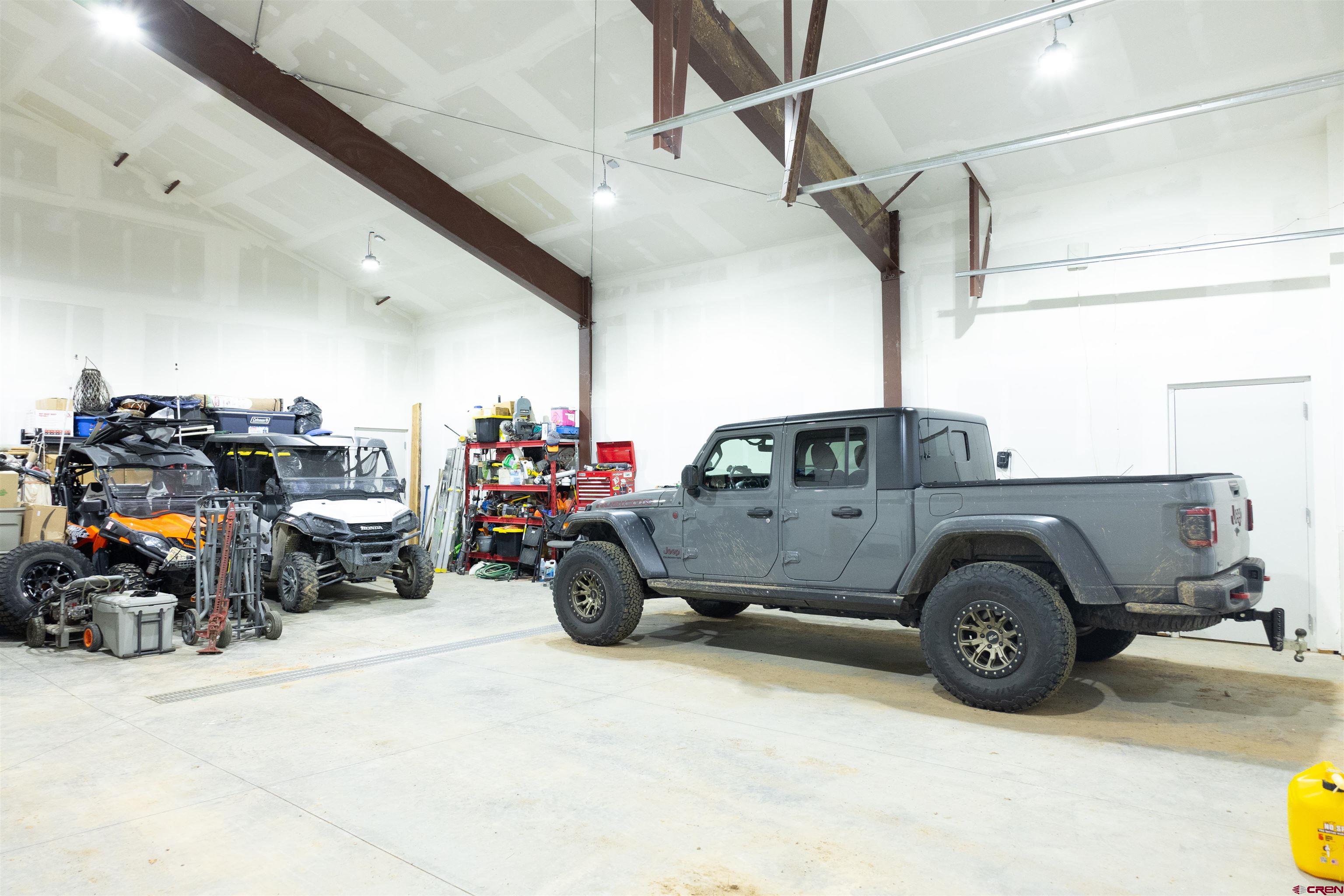 2632 Taylor Ranch Road Durango, CO 81301 - Photo 17 of 35 a car parked in garage