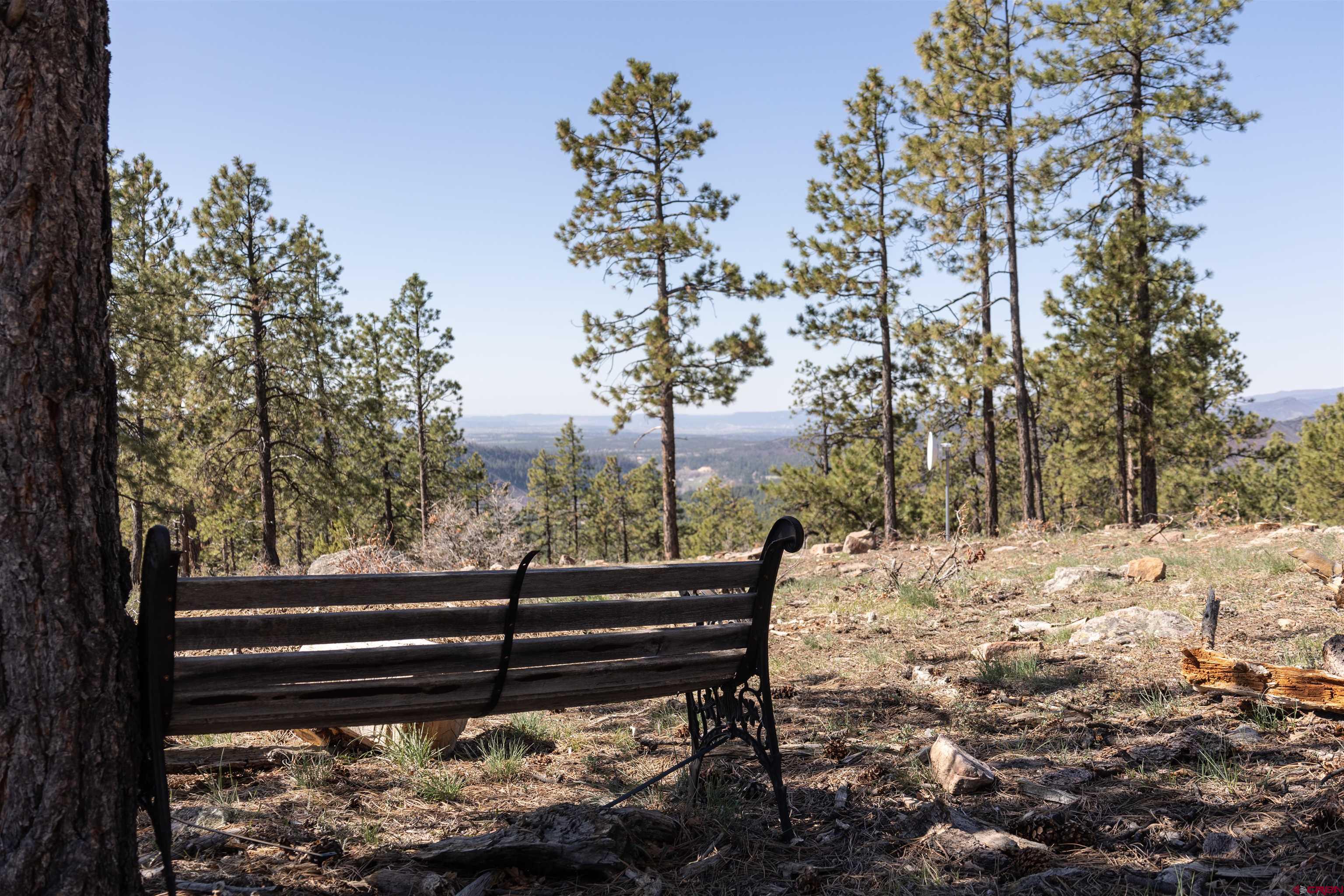 2632 Taylor Ranch Road Durango, CO 81301 - Photo 21 of 35 a view of a bench in a yard