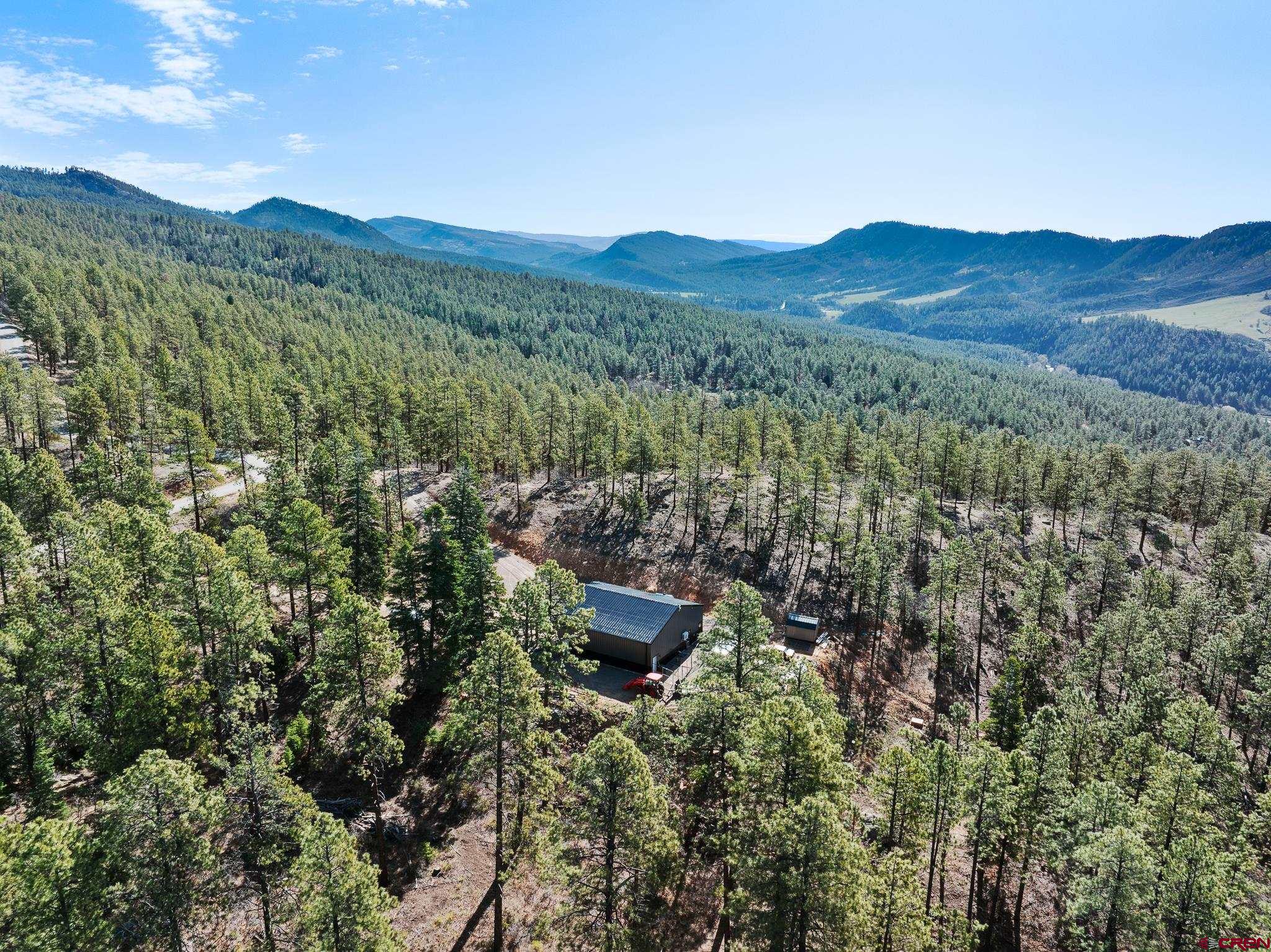 2632 Taylor Ranch Road Durango, CO 81301 - Photo 26 of 35 a view of a top of a house with a mountain