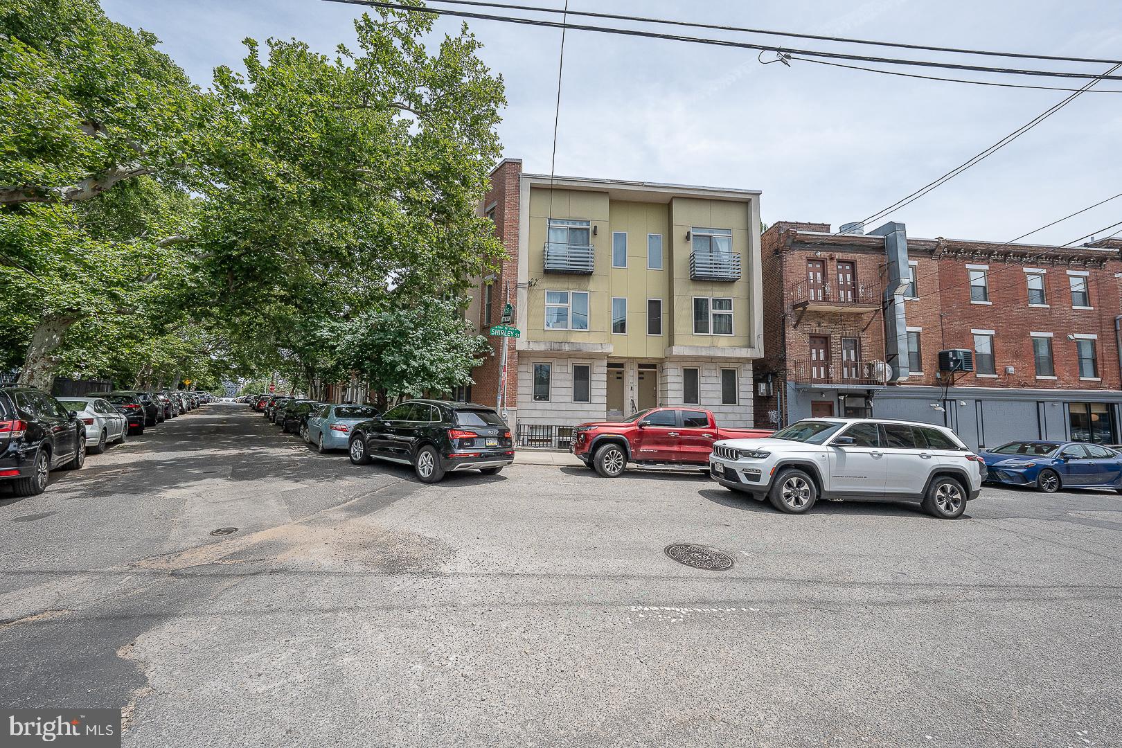 715 Shirley Street, Unit A Philadelphia, PA 19130 - Photo 24 of 24 a view of street with parked cars