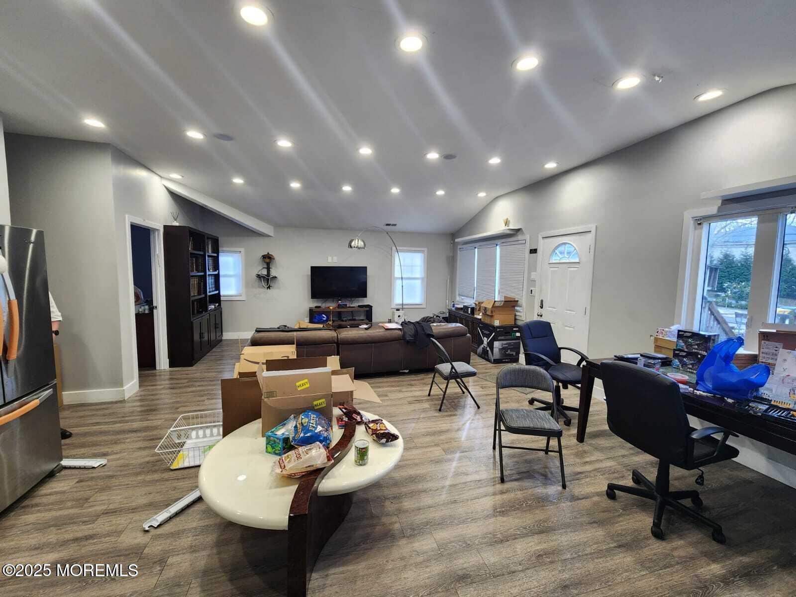 215 Miller Road Lakewood, NJ 08701 - Photo 2 of 12 a living room with furniture and a flat screen tv