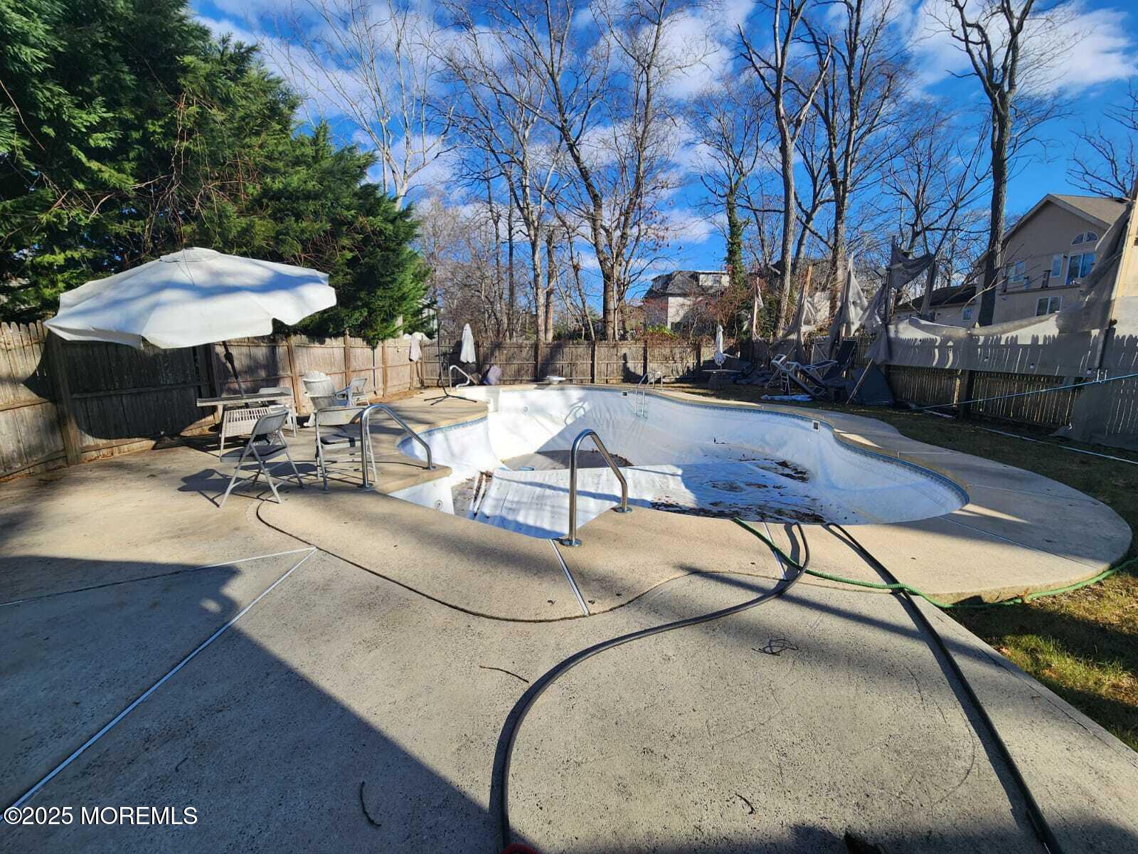 215 Miller Road Lakewood, NJ 08701 - Photo 8 of 12 a view of a backyard with sitting area