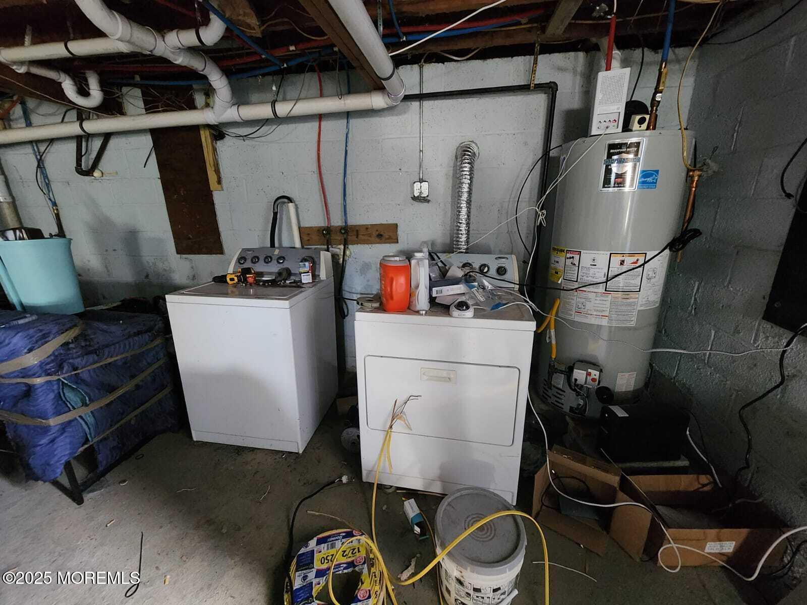 215 Miller Road Lakewood, NJ 08701 - Photo 10 of 12 a room with water heater and storage