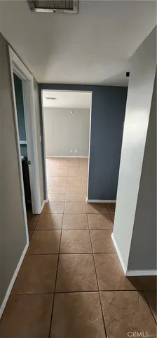 a kitchen with a sink a refrigerator and a stove