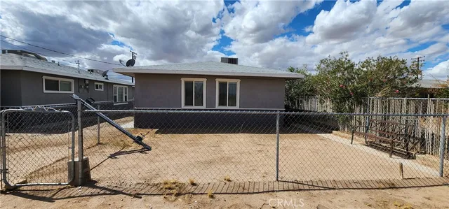 a house with trees in front of it