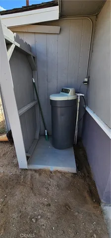 a view of a room with wooden walls