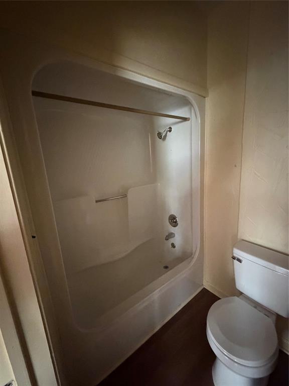 257 West Acres Road Gun Barrel City, TX 75156 - Photo 16 of 22 a bathroom with a shower and a toilet