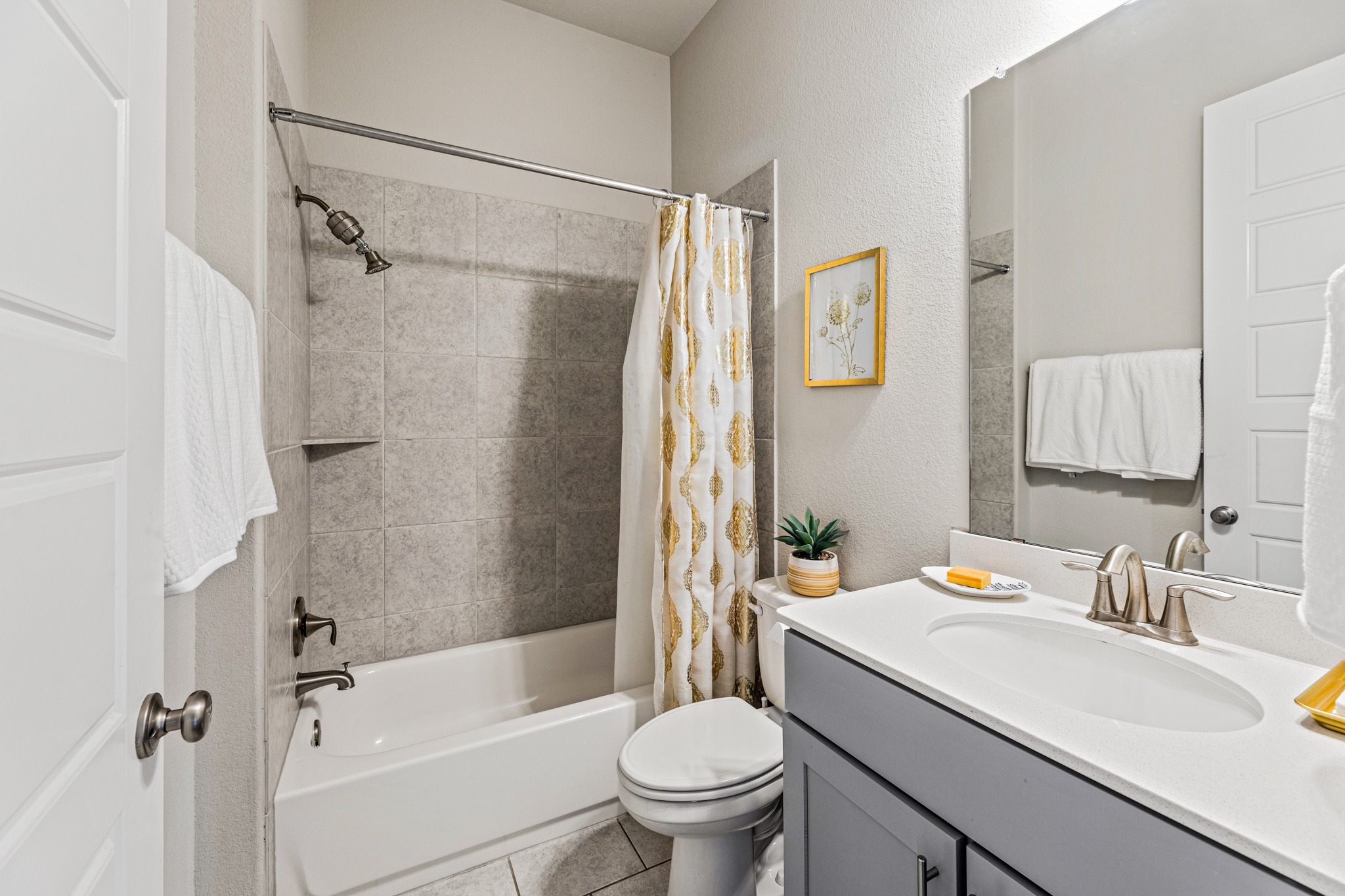 108 Redtail Lane Leander, TX 78641 - Photo 26 of 39 Downstairs full bathroom with spacious vanity and shower-tub combination