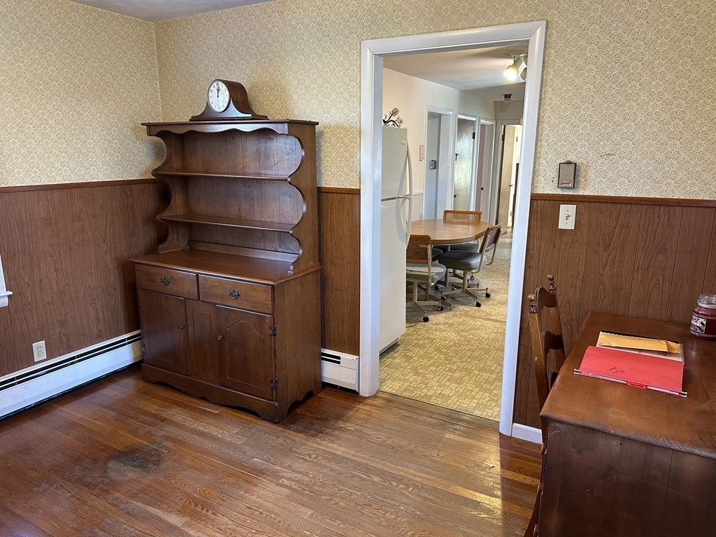 51 Prudential Road Worcester, MA 01606 - Photo 17 of 26 a utility room with closet and wooden floor