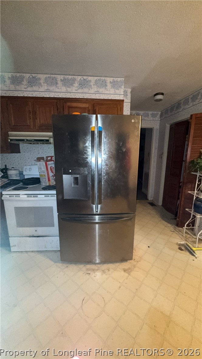 7939 Clinton Road Stedman, NC 28391 - Photo 16 of 50 a room with water heater and storage
