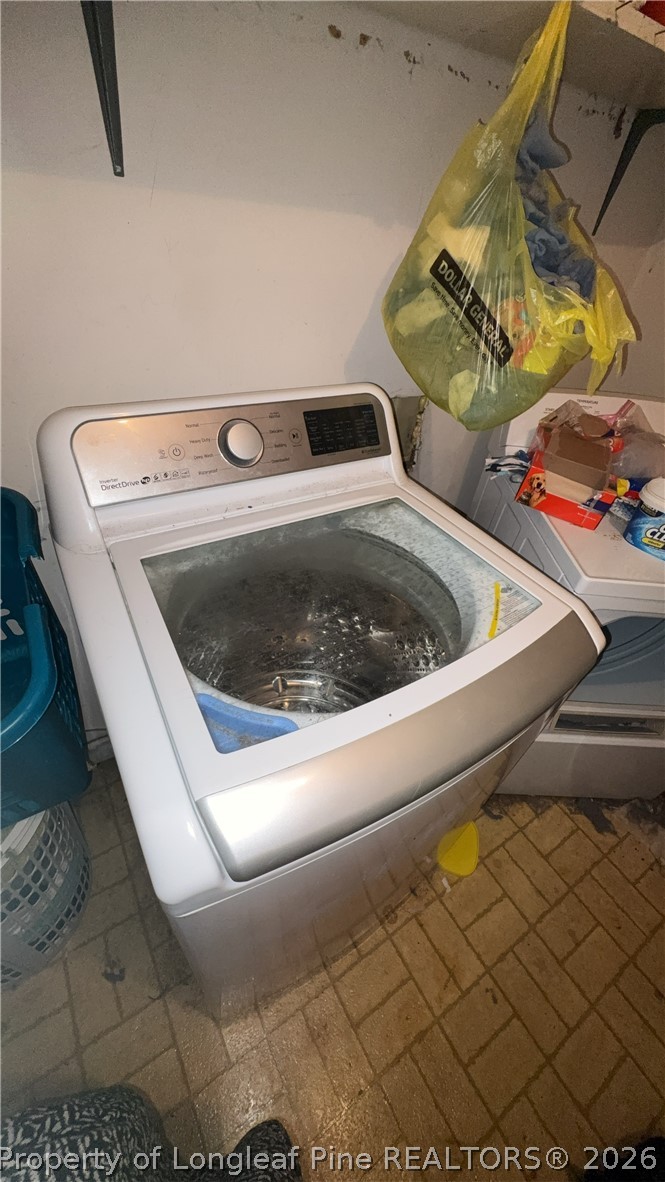7939 Clinton Road Stedman, NC 28391 - Photo 19 of 50 a utility room with dryer and washer