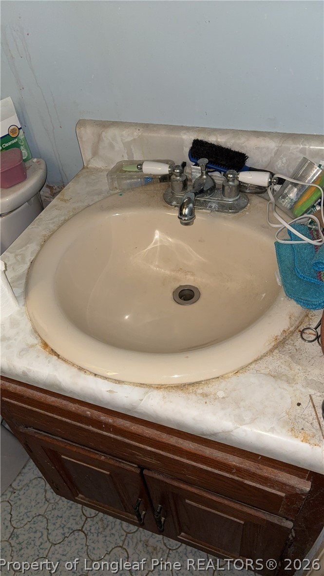7939 Clinton Road Stedman, NC 28391 - Photo 36 of 50 a bathroom with a sink
