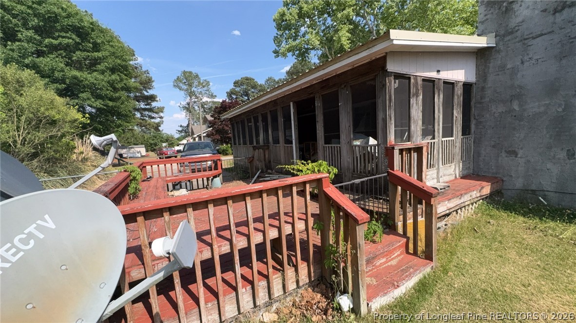 7939 Clinton Road Stedman, NC 28391 - Photo 45 of 50 a balcony with table and chairs