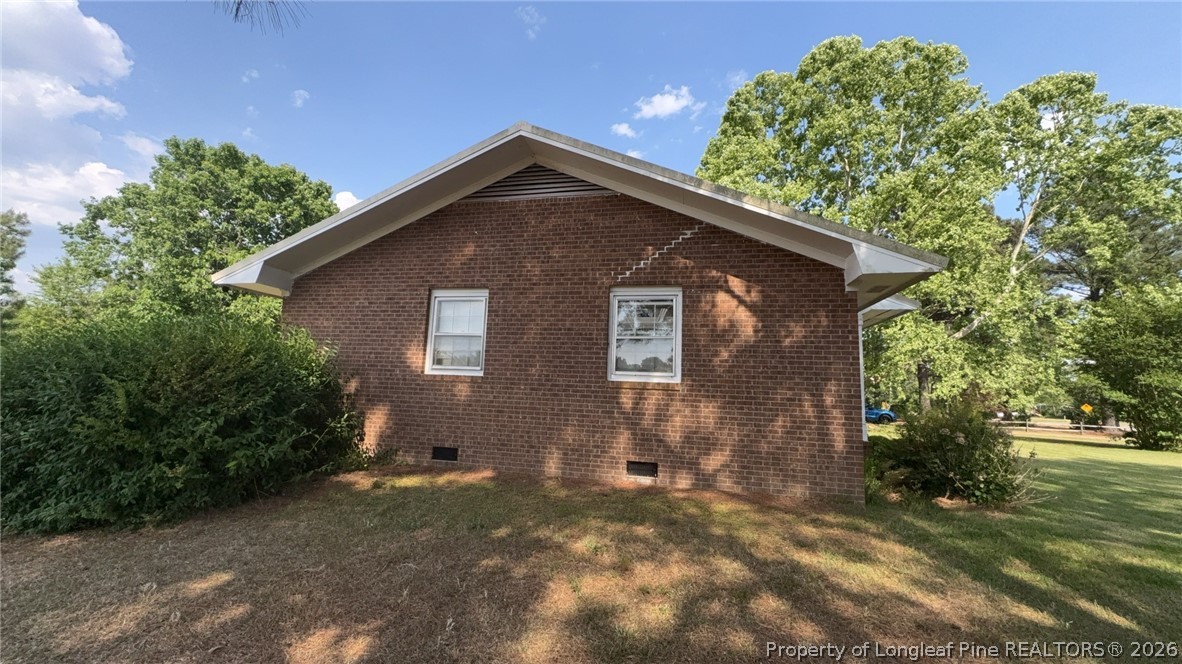 7939 Clinton Road Stedman, NC 28391 - Photo 46 of 50 a front view of a house with a yard
