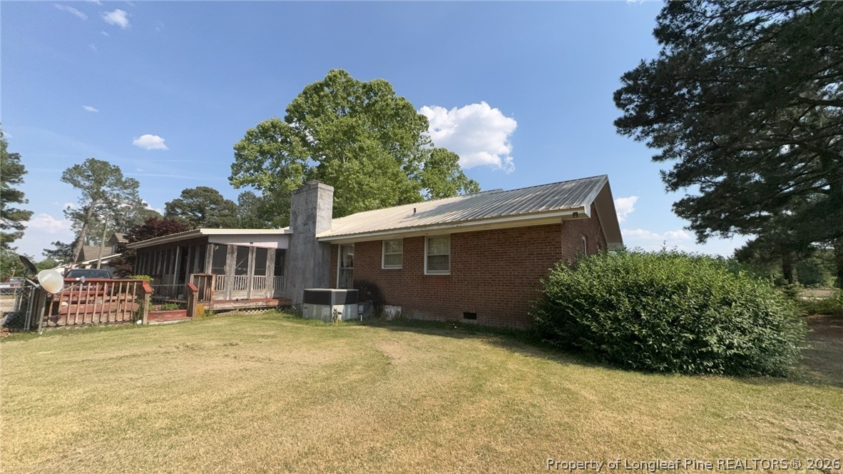 7939 Clinton Road Stedman, NC 28391 - Photo 50 of 50 a front view of a house with a yard