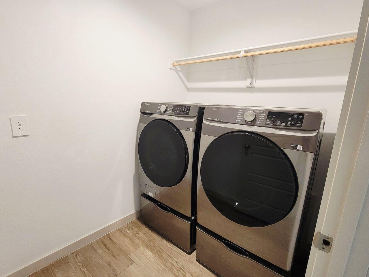 7324 9th Street Lubbock, TX 79416 - Photo 13 of 21 a utility room with dryer and washer