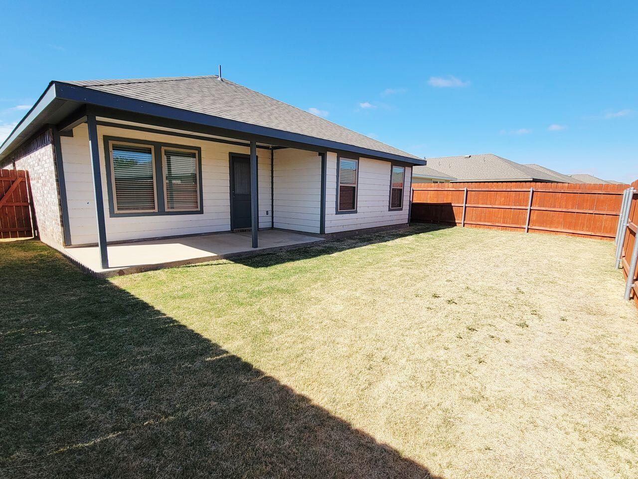 7324 9th Street Lubbock, TX 79416 - Photo 21 of 21 a house with yard in front of it