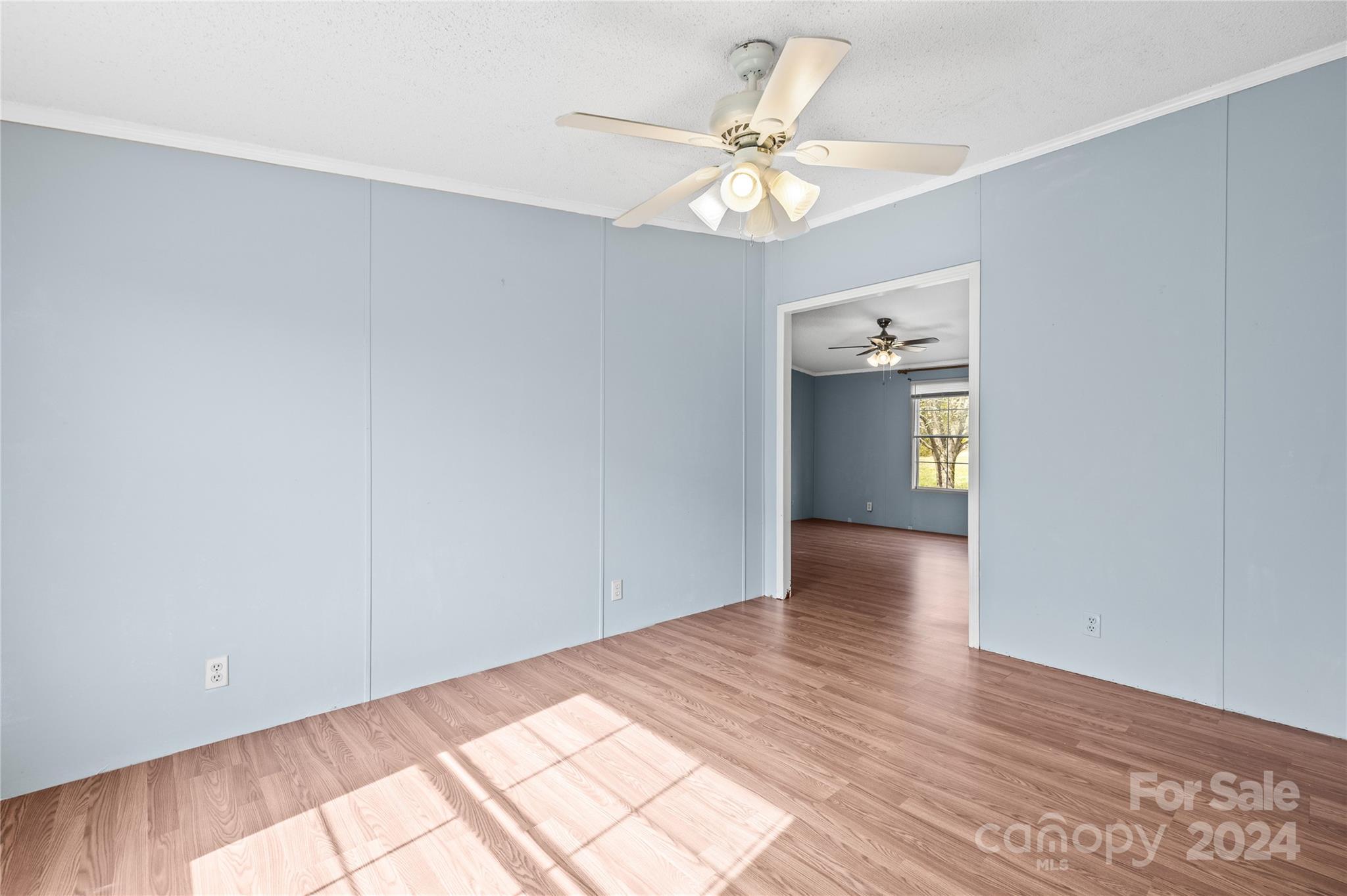 436 Beth Haven Church Road Denver, NC 28037 - Photo 13 of 32 a view of an empty room with wooden floor