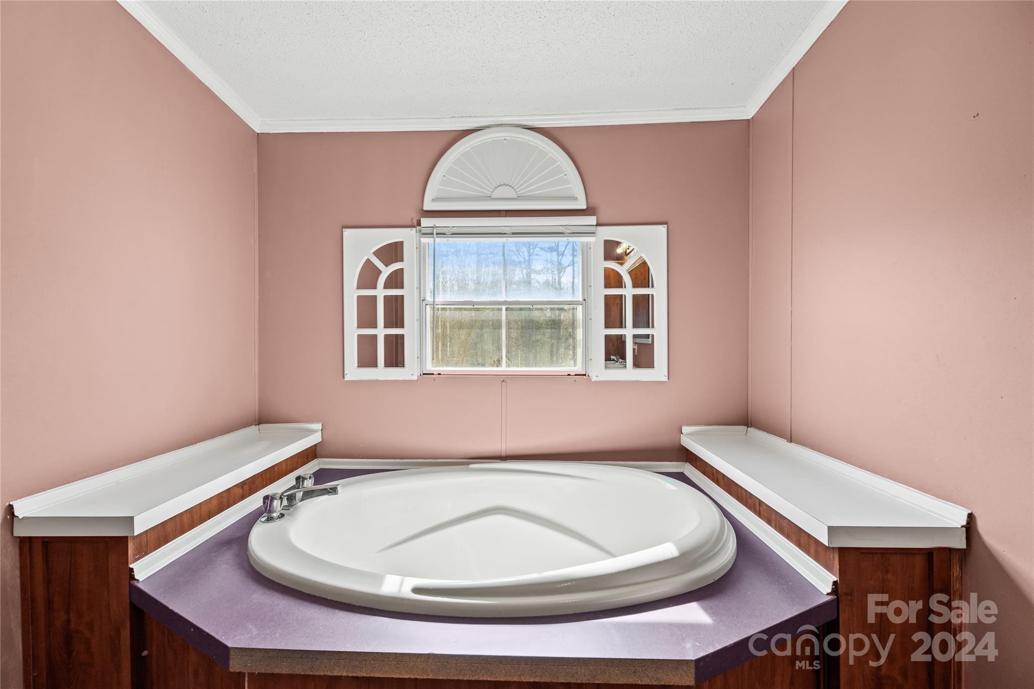 436 Beth Haven Church Road Denver, NC 28037 - Photo 17 of 32 a bathroom with a sink a mirror and a window