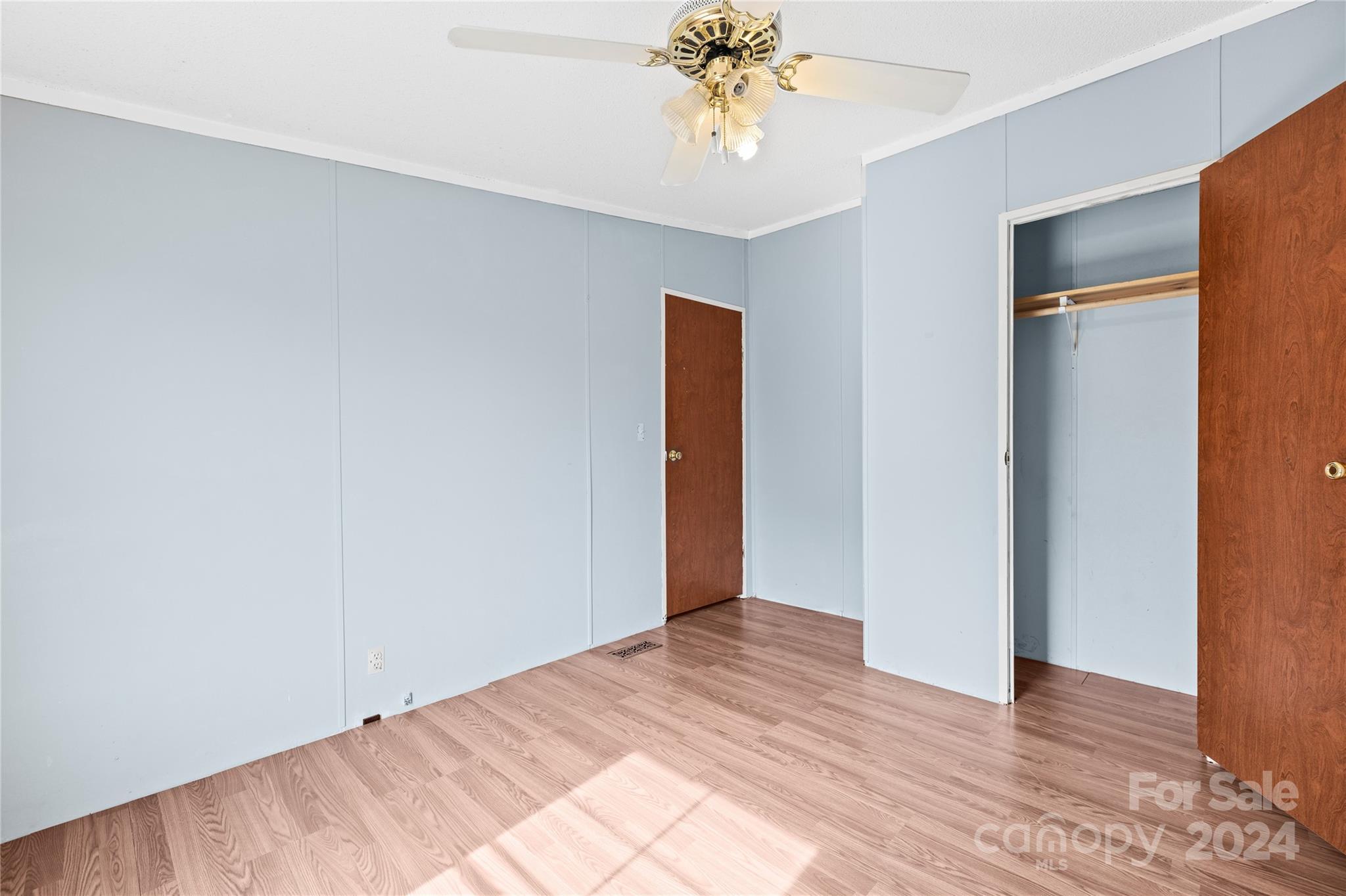 436 Beth Haven Church Road Denver, NC 28037 - Photo 18 of 32 a view of an empty room with wooden floor