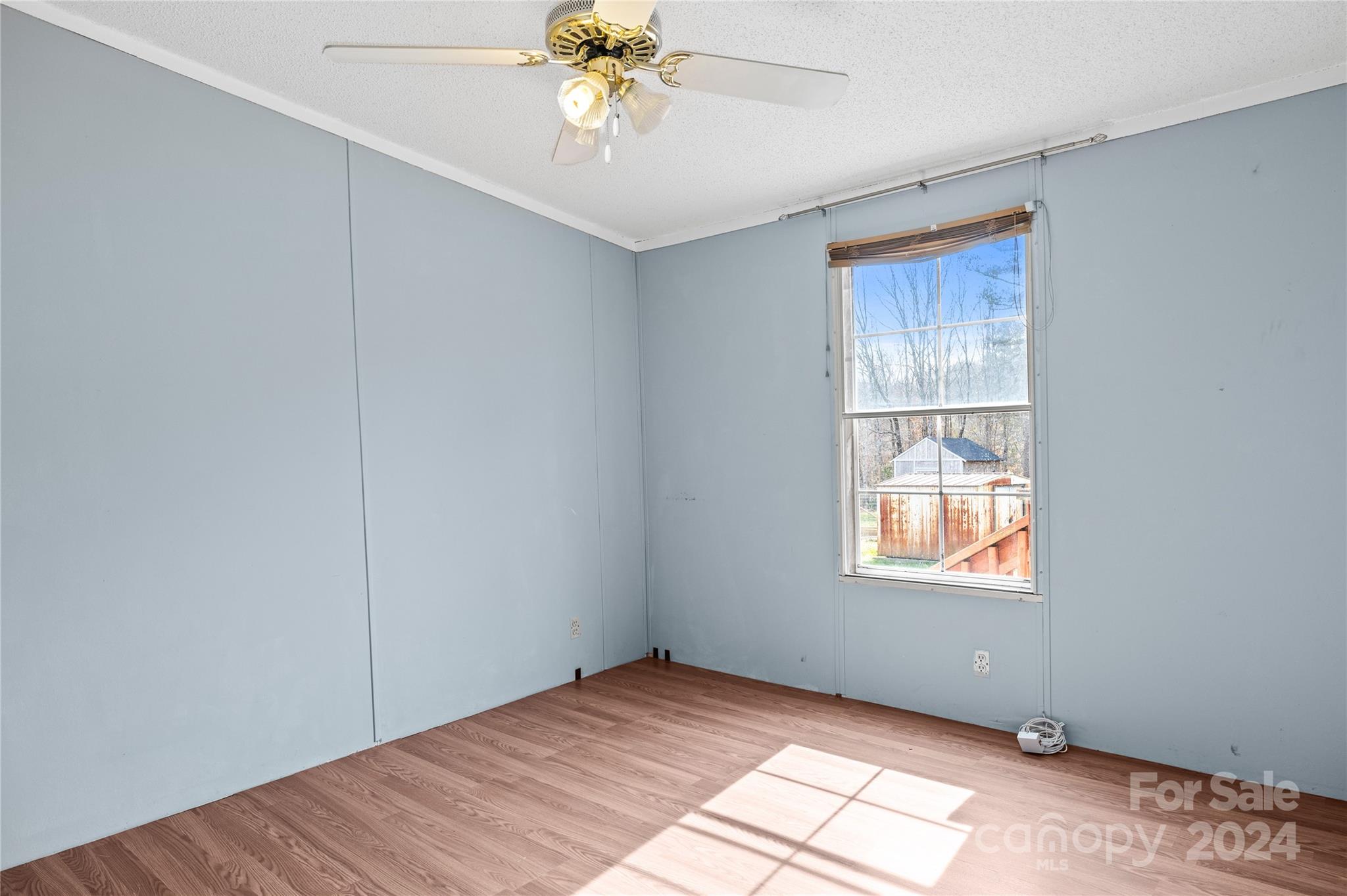 436 Beth Haven Church Road Denver, NC 28037 - Photo 19 of 32 an empty room with windows and fan
