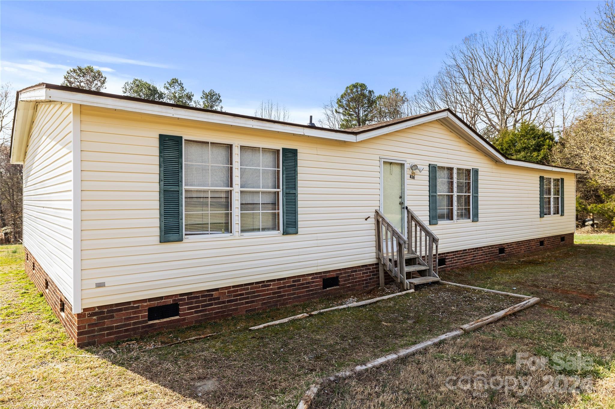 436 Beth Haven Church Road Denver, NC 28037 - Photo 2 of 32 a view of a house with a yard and sitting area