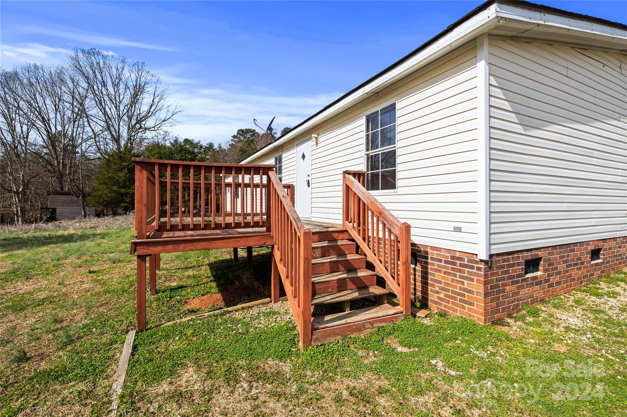 436 Beth Haven Church Road Denver, NC 28037 - Photo 27 of 32 a view of a house with backyard and deck