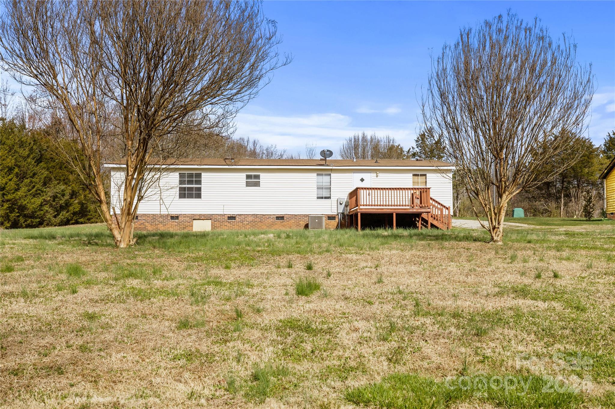 436 Beth Haven Church Road Denver, NC 28037 - Photo 28 of 32 a view of a yard in front of a house