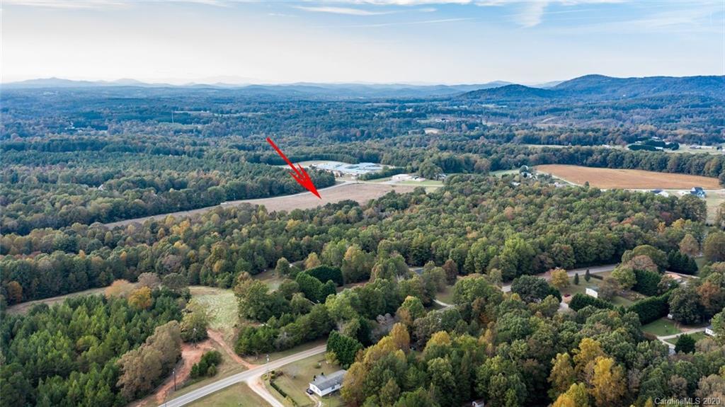7241 Church Road Taylorsville, NC 28681 - Photo 12 of 27 an aerial view of residential house and sandy dunes