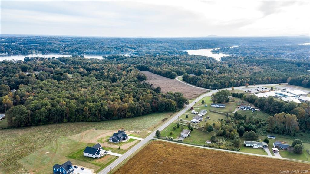 7241 Church Road Taylorsville, NC 28681 - Photo 17 of 27 a view of a lake with a yard