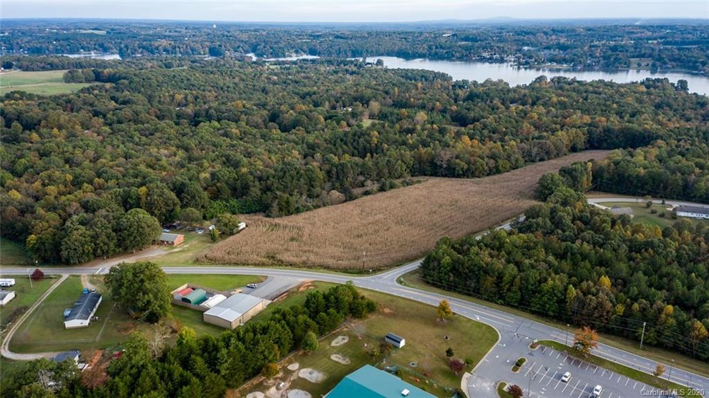 7241 Church Road Taylorsville, NC 28681 - Photo 22 of 27 an aerial view of a city with lots of residential buildings