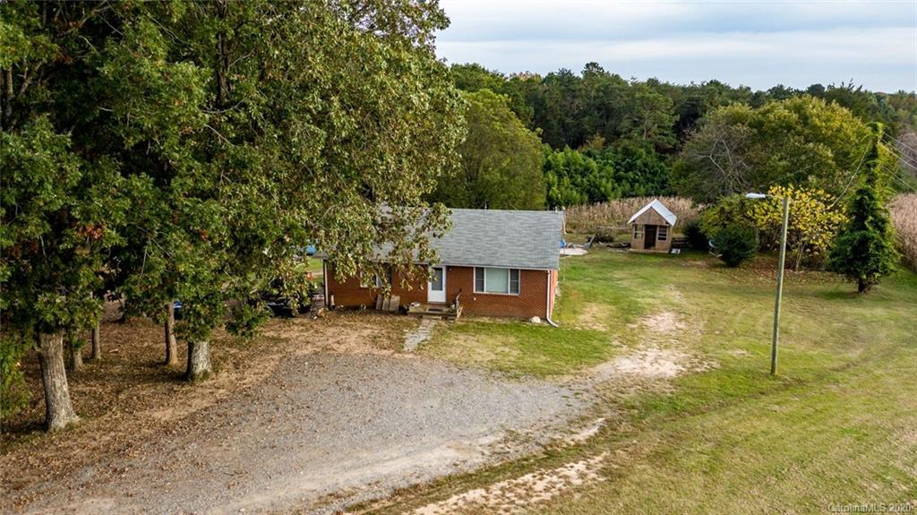 7241 Church Road Taylorsville, NC 28681 - Photo 25 of 27 a view of a house with backyard porch and sitting area
