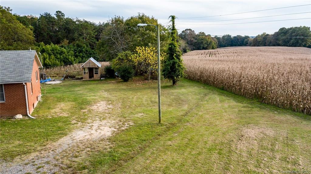 7241 Church Road Taylorsville, NC 28681 - Photo 27 of 27 a backyard of a house with lots of green space