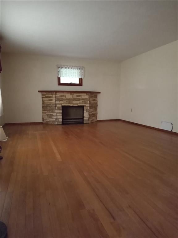 3292 Georgetown Road Polk, PA 16342 - Photo 16 of 24 a view of an empty room with a fireplace and a fireplace