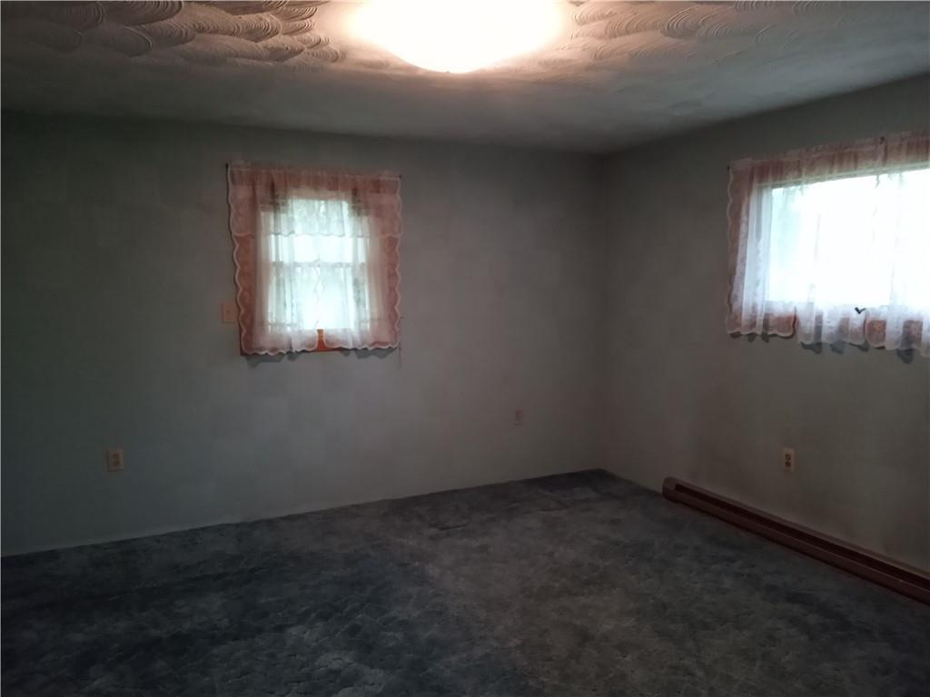 3292 Georgetown Road Polk, PA 16342 - Photo 18 of 24 an empty room with a window
