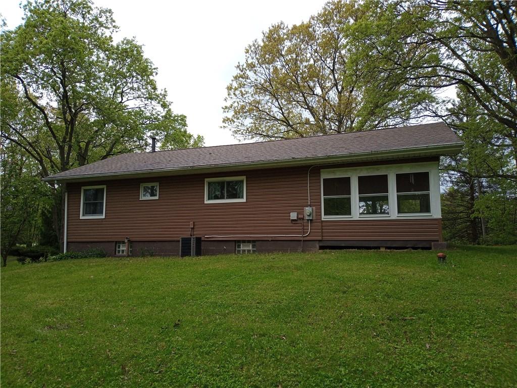 3292 Georgetown Road Polk, PA 16342 - Photo 2 of 24 a front view of a house with a yard